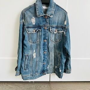 Zara Distressed & Ripped Denim Jacket in light blue .